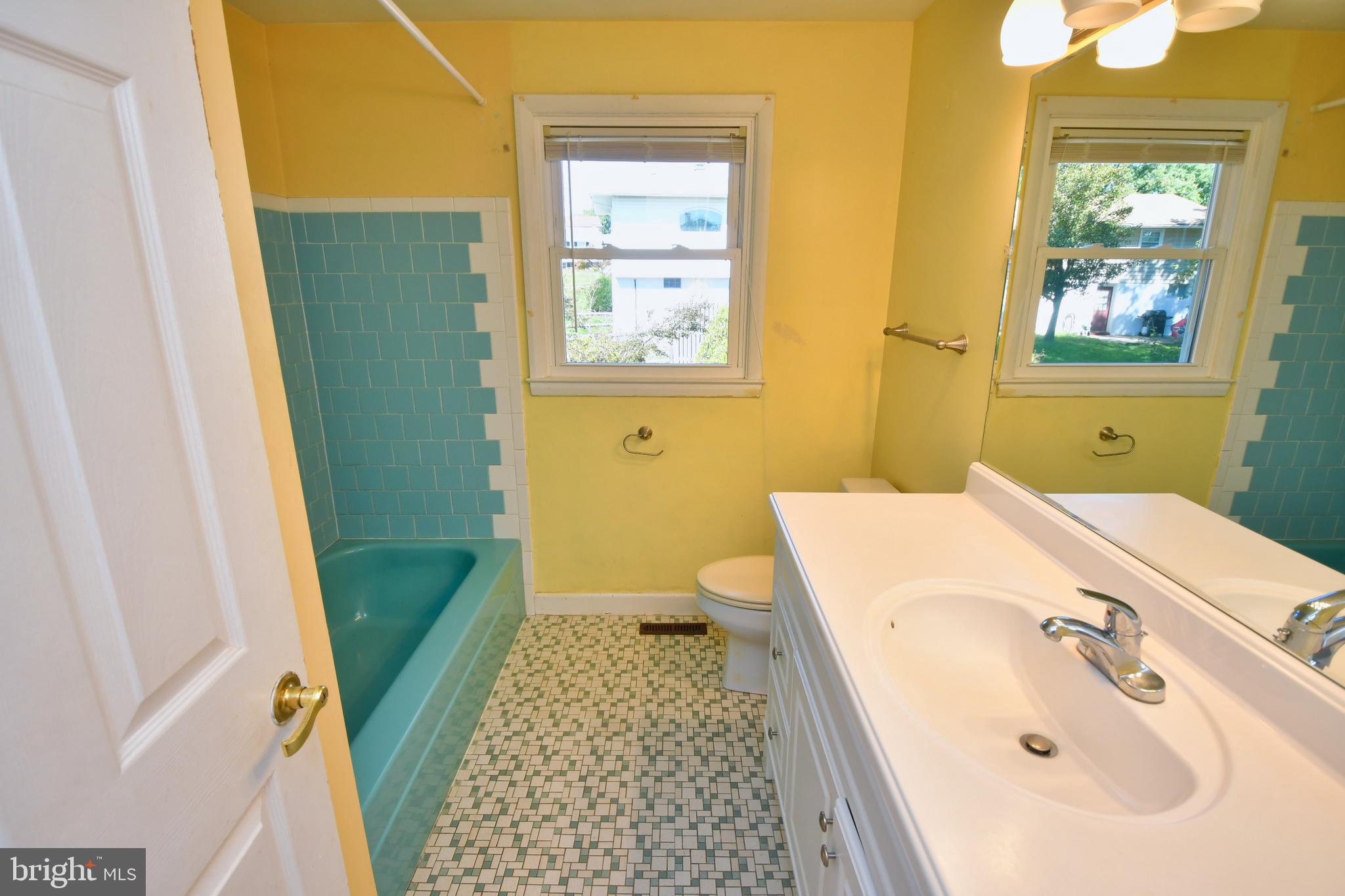 4704 Ebenezer Road Nottingham, MD 21236 - Photo 21 of 56 a bathroom with a sink and a bathtub