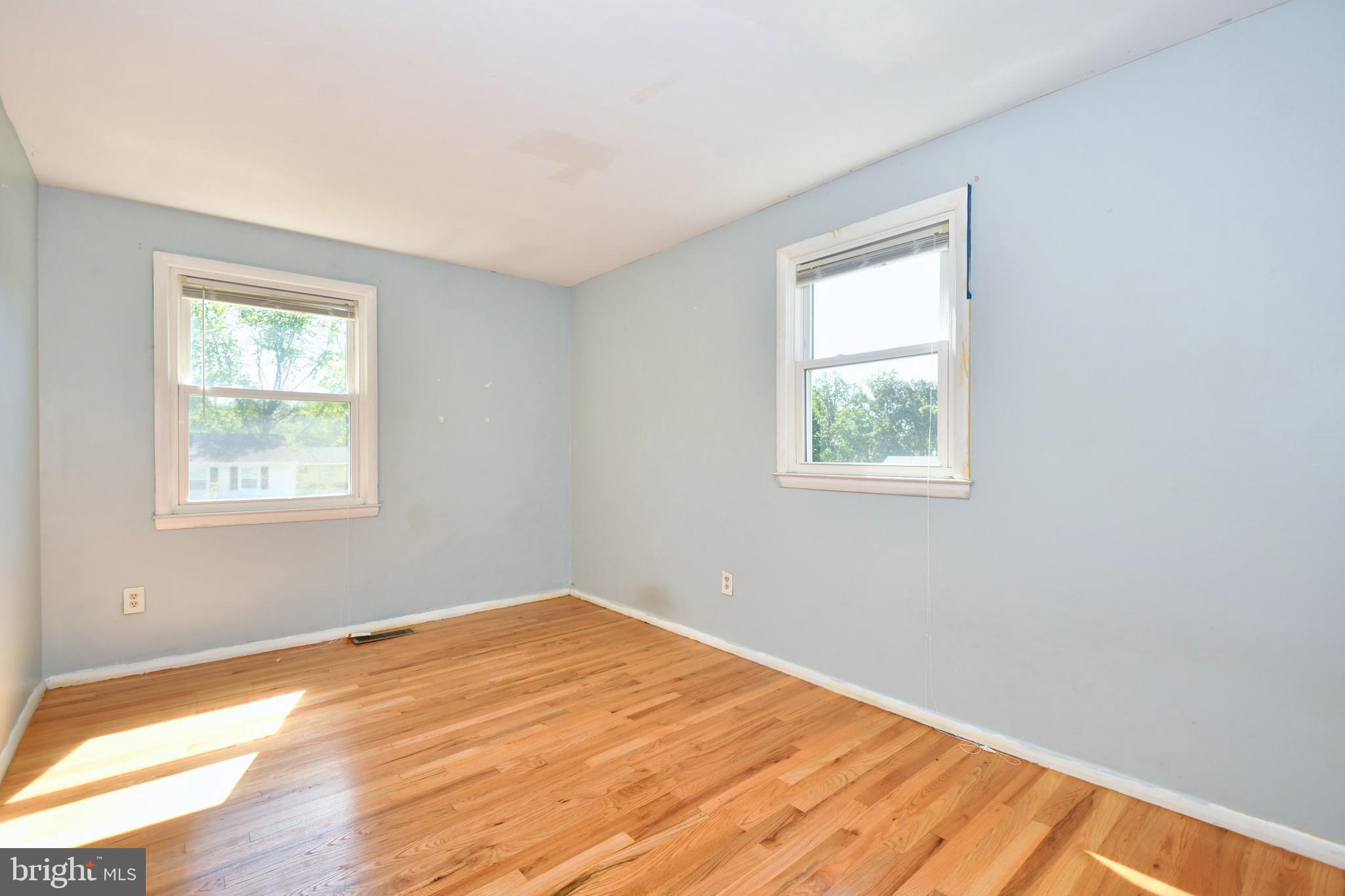 4704 Ebenezer Road Nottingham, MD 21236 - Photo 29 of 56 a view of a room with wooden floor and a window