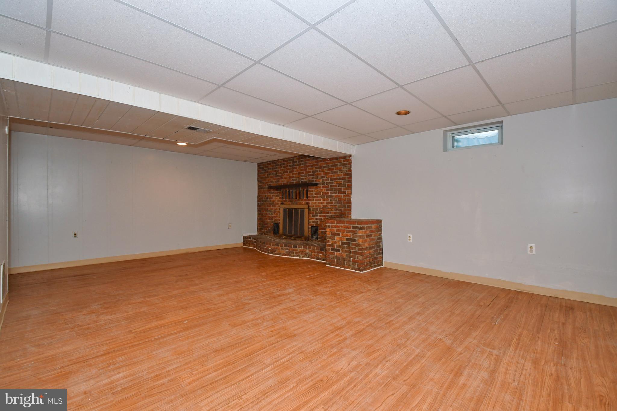 4704 Ebenezer Road Nottingham, MD 21236 - Photo 36 of 56 a view of empty room with wooden floor
