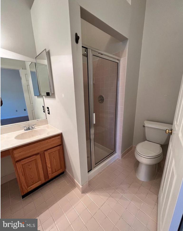 3303 Sterling Road Yardley, PA 19067 - Photo 13 of 16 a bathroom with a sink a toilet and shower