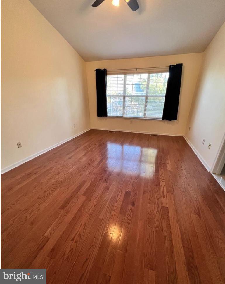 3303 Sterling Road Yardley, PA 19067 - Photo 10 of 16 wooden floor in an empty room with a window
