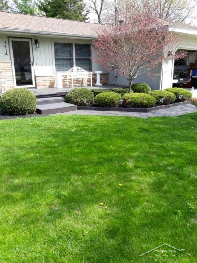 1414 Midland Road Saginaw, MI 48638 - Photo 2 of 21 Spring 2020 Landscaping