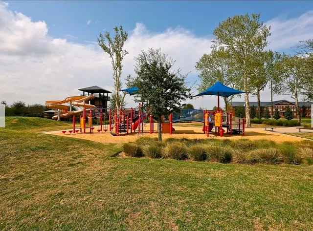 a view of a swimming pool with an outdoor space and seating area