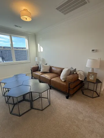 a bedroom with bed and window