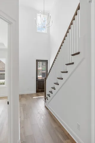 a view of a kitchen with a sink and a fireplace
