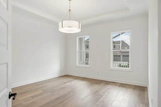 a spacious bathroom with a shower sink double and mirror
