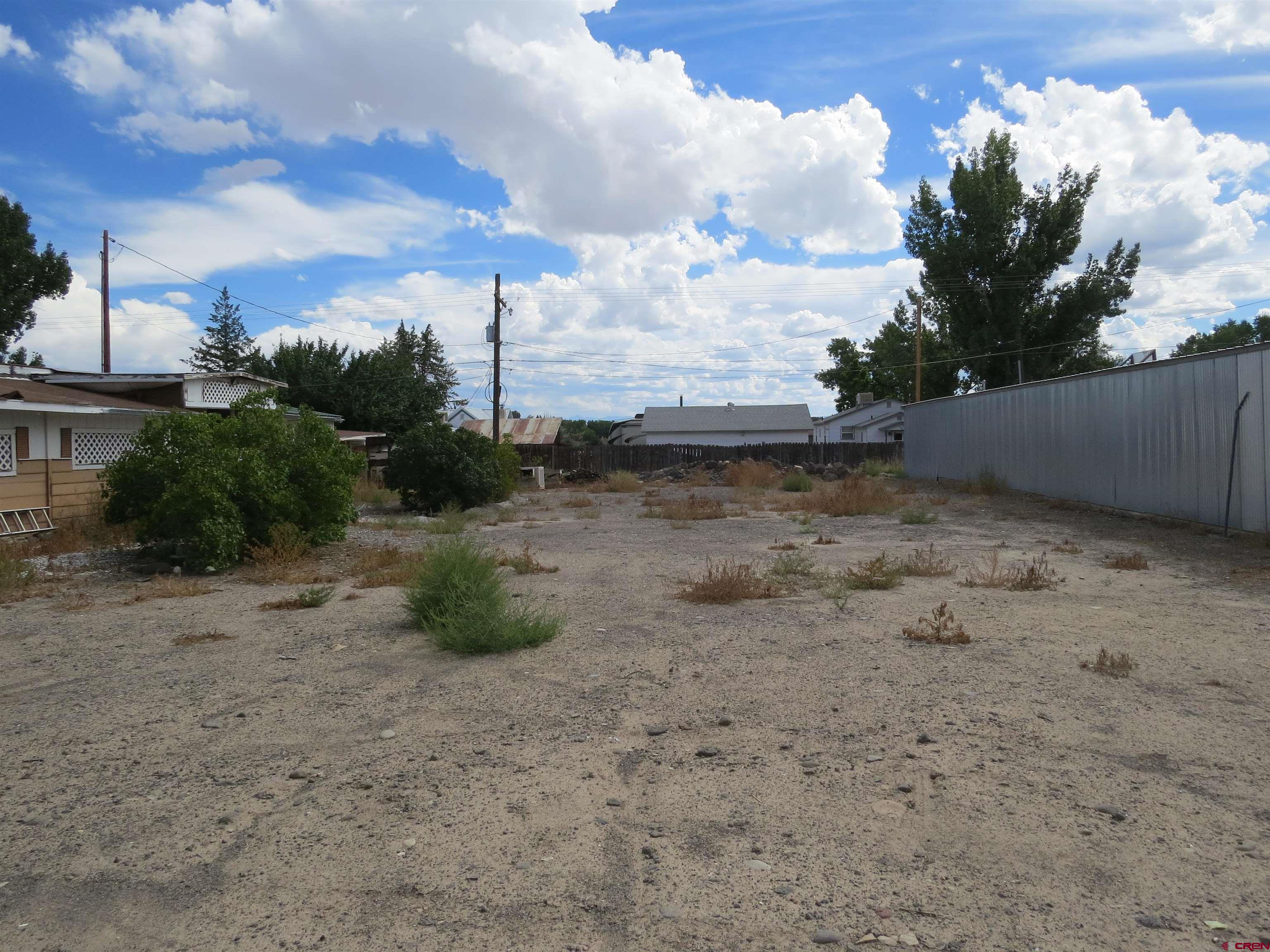 Tbd Canal Street Austin, CO 81410 - Photo 2 of 6 a view of a dry yard with wooden fence