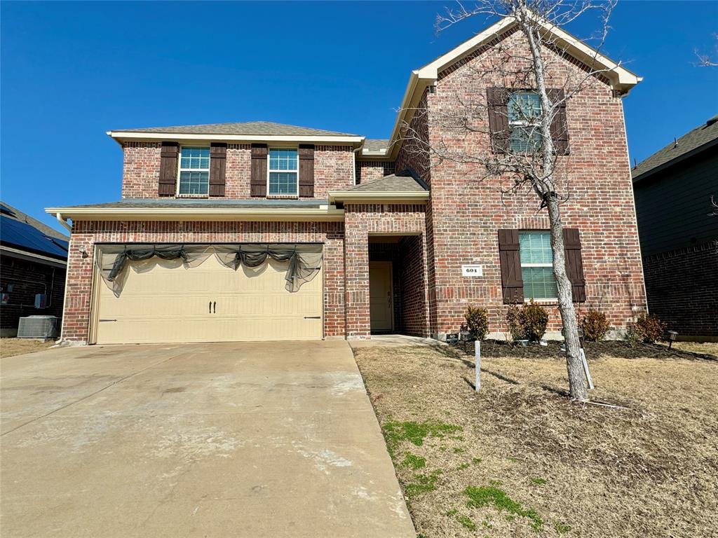 604 Gunsmoke Trail Princeton, TX 75407 - Photo 1 of 1 a front view of a house with a yard