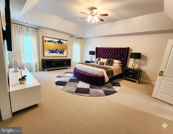 a living room with furniture gym equipment and a flat screen tv