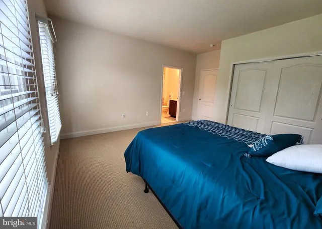 a view of hallway with wooden floor