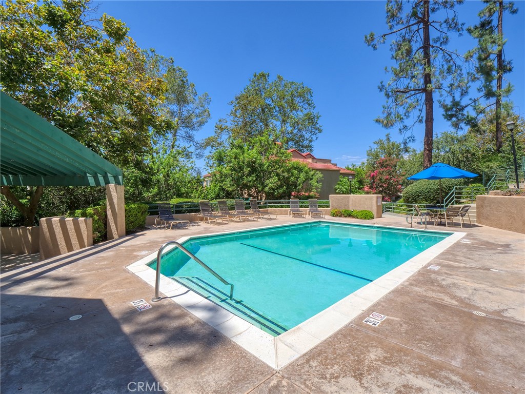 2910 Malaga Circle, Unit A Diamond Bar, CA 91765 - Photo 50 of 52 a view of a tennis ground with large trees