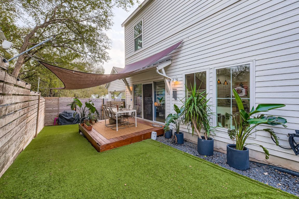 1213 Eleanor Street, Unit B Austin, TX 78721 - Photo 16 of 17 a view of a house with backyard porch and sitting area