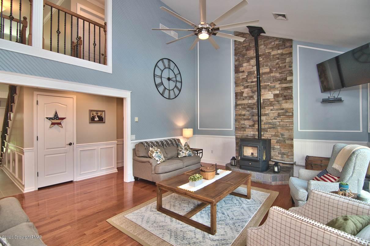 659 Behrens Road Jim Thorpe, PA 18229 - Photo 25 of 116 a living room with furniture a rug and a window