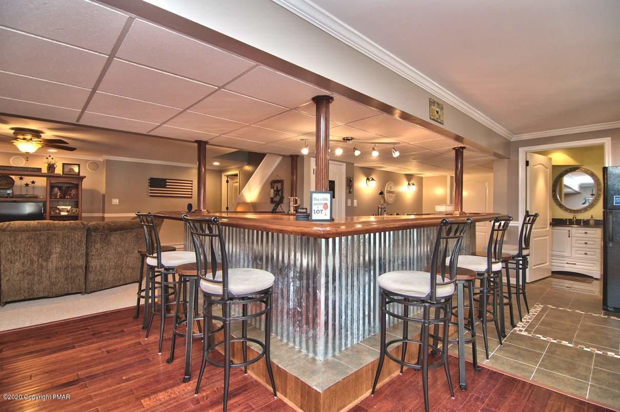 659 Behrens Road Jim Thorpe, PA 18229 - Photo 70 of 116 a view of a dining room with furniture window and wooden floor