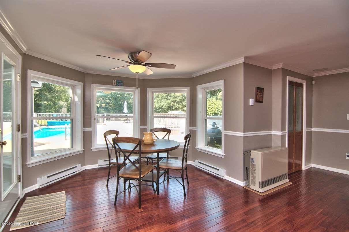 659 Behrens Road Jim Thorpe, PA 18229 - Photo 72 of 116 a view of a dining room with furniture window and wooden floor