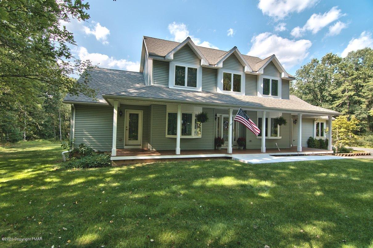 659 Behrens Road Jim Thorpe, PA 18229 - Photo 8 of 116 a front view of a house with a garden