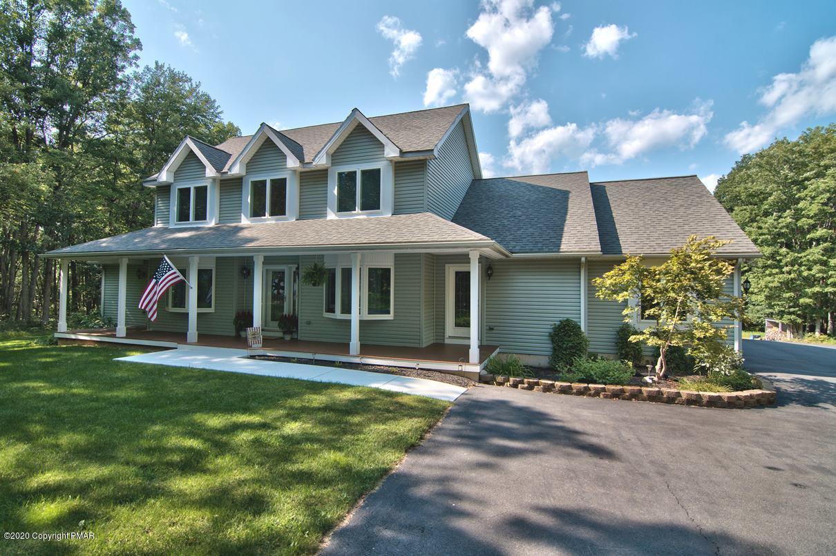 659 Behrens Road Jim Thorpe, PA 18229 - Photo 9 of 116 a front view of a house with a yard