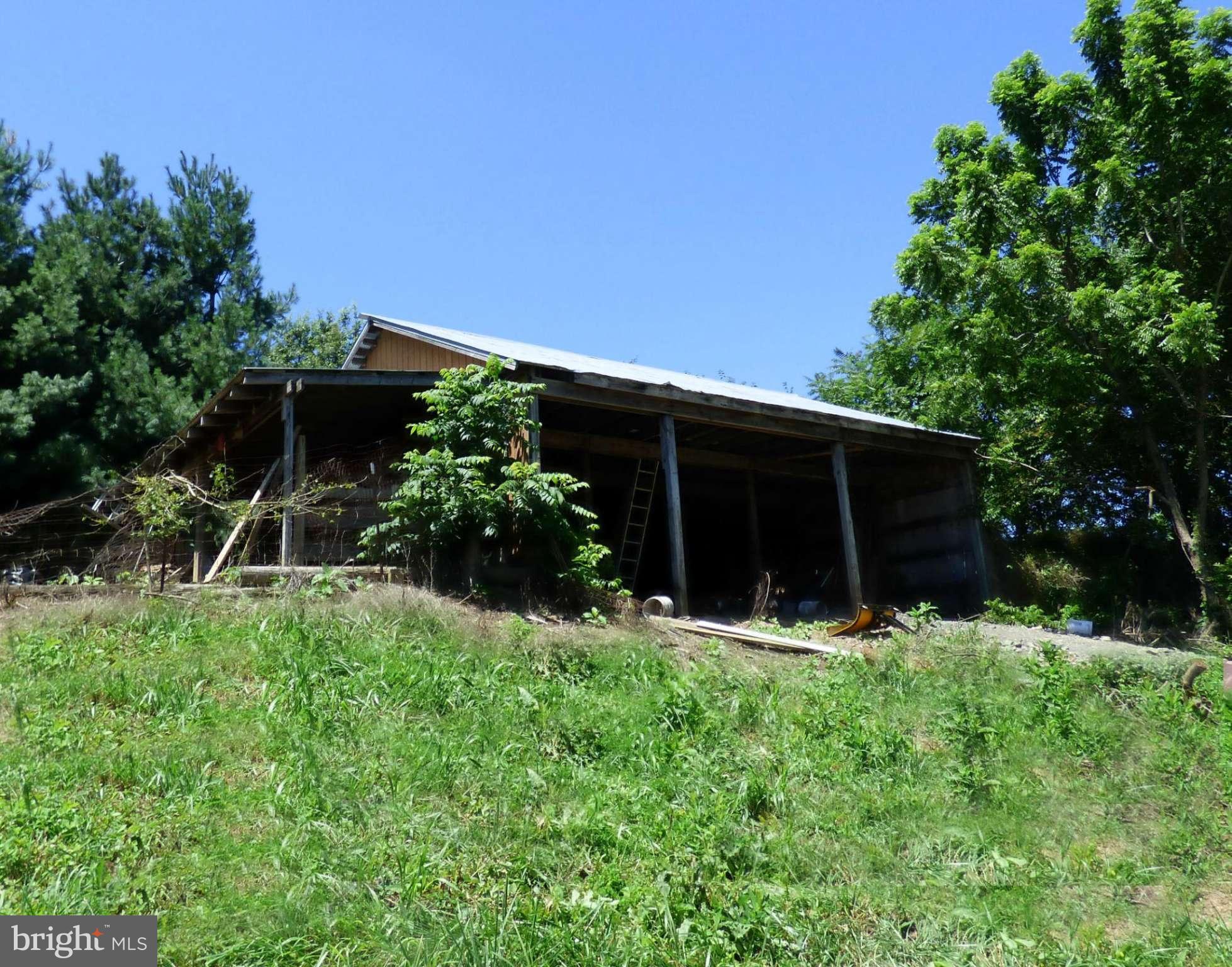 8409 Mapleville Road Mount Airy, MD 21771 - Photo 23 of 30 a backyard of a house with lots of green space