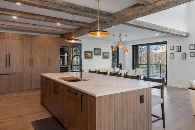 a kitchen with stainless steel appliances granite countertop a sink and cabinets
