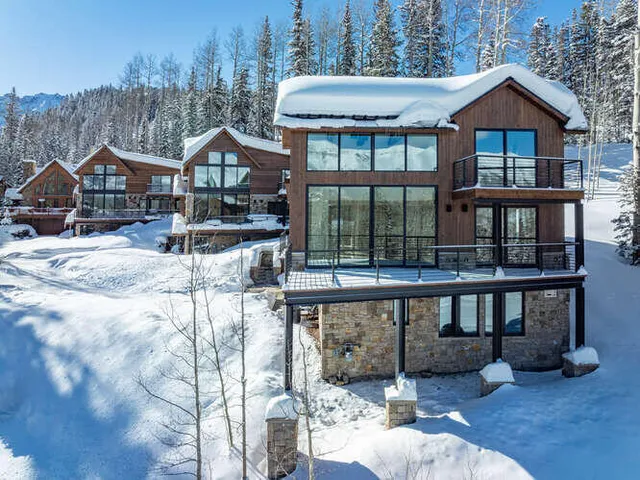 a view of a house with roof deck
