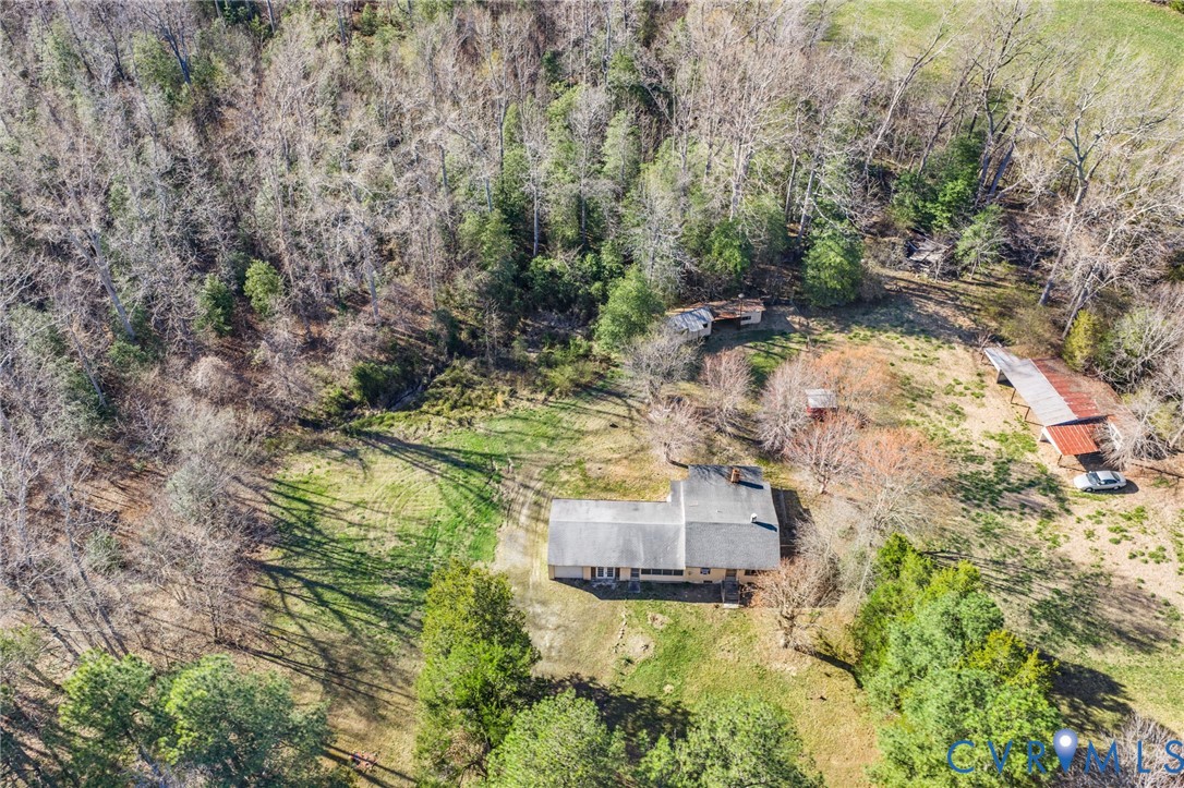19161 Hollowing Creek Road Beaverdam, VA 23015 - Photo 3 of 27 a aerial view of a house with swimming pool and large trees