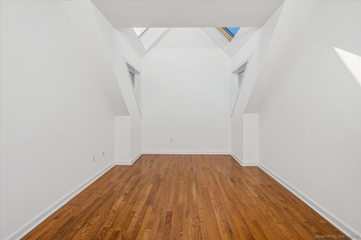 66 Wilton Crest Road, Unit 66 Wilton, CT 06897 - Photo 15 of 25 a view of small space with wooden floor