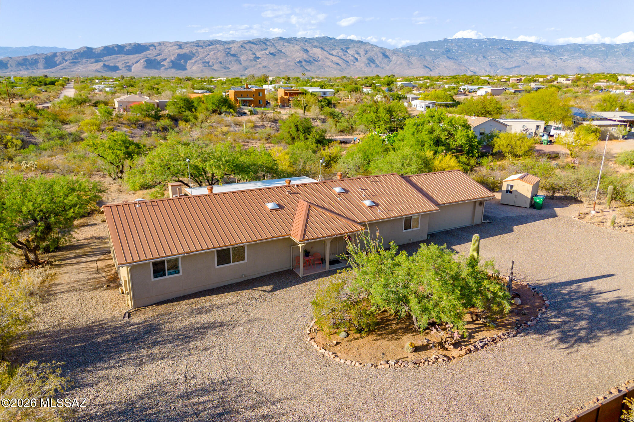 13599 East Rincon Ranch Road Vail, AZ 85641 - Photo 39 of 41 an aerial view of a house with a yard