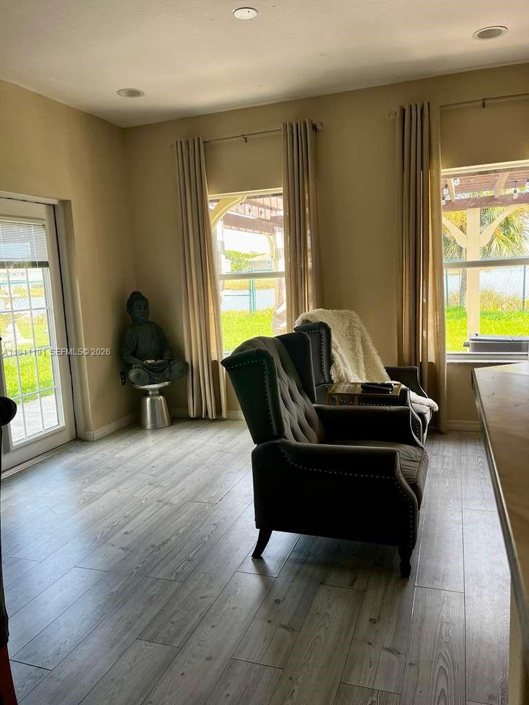 1531 Southeast 20th Road Homestead, FL 33035 - Photo 5 of 10 a living room with furniture and a large window