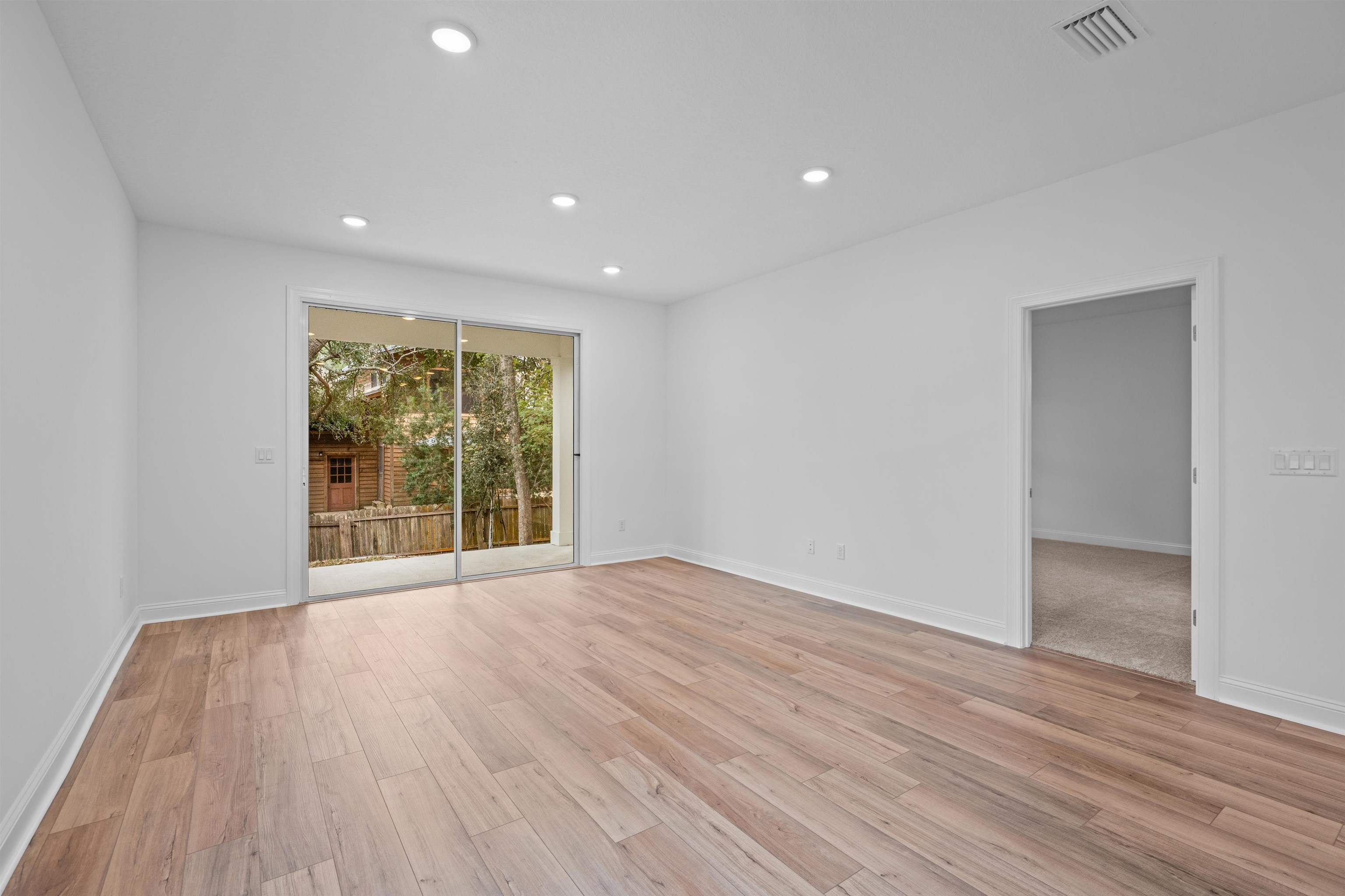 108 Aspen Road St. Augustine, FL 32086 - Photo 15 of 24 Unfurnished room featuring light wood-style floors and recessed lighting
