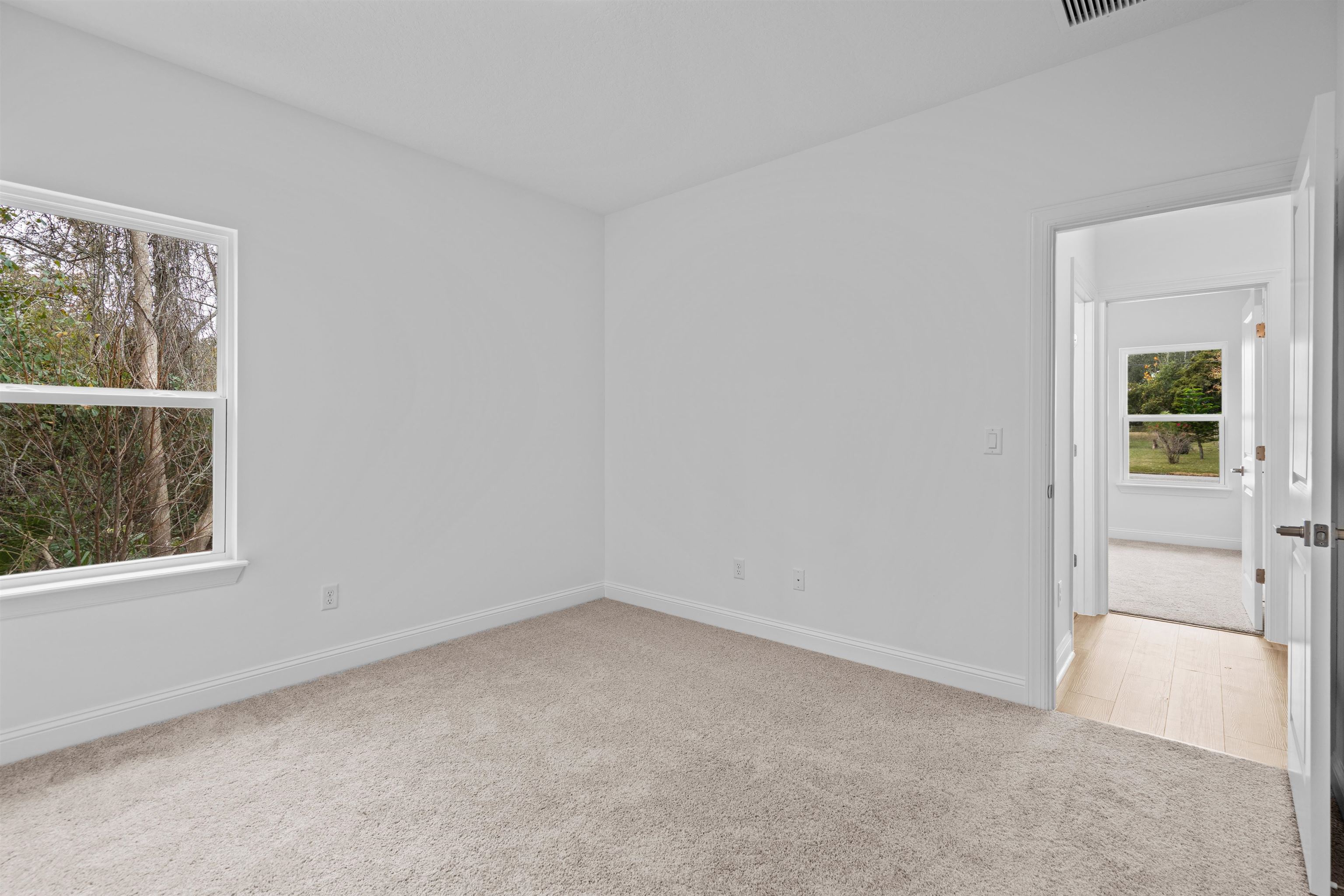 108 Aspen Road St. Augustine, FL 32086 - Photo 8 of 24 Unfurnished room featuring light carpet