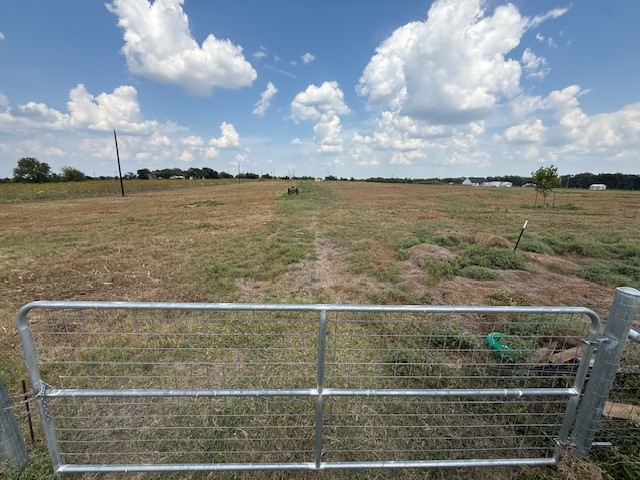 1079 Lomax Harmel Road Burton, TX 77835 - Photo 5 of 12 View of yard featuring a view of rural / pastoral area
