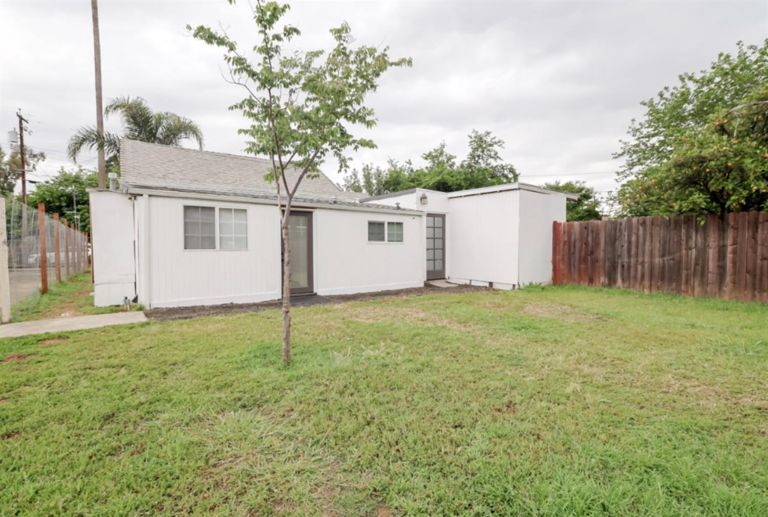 2331 Downar Way Sacramento, CA 95838 - Photo 22 of 23 a house with a yard