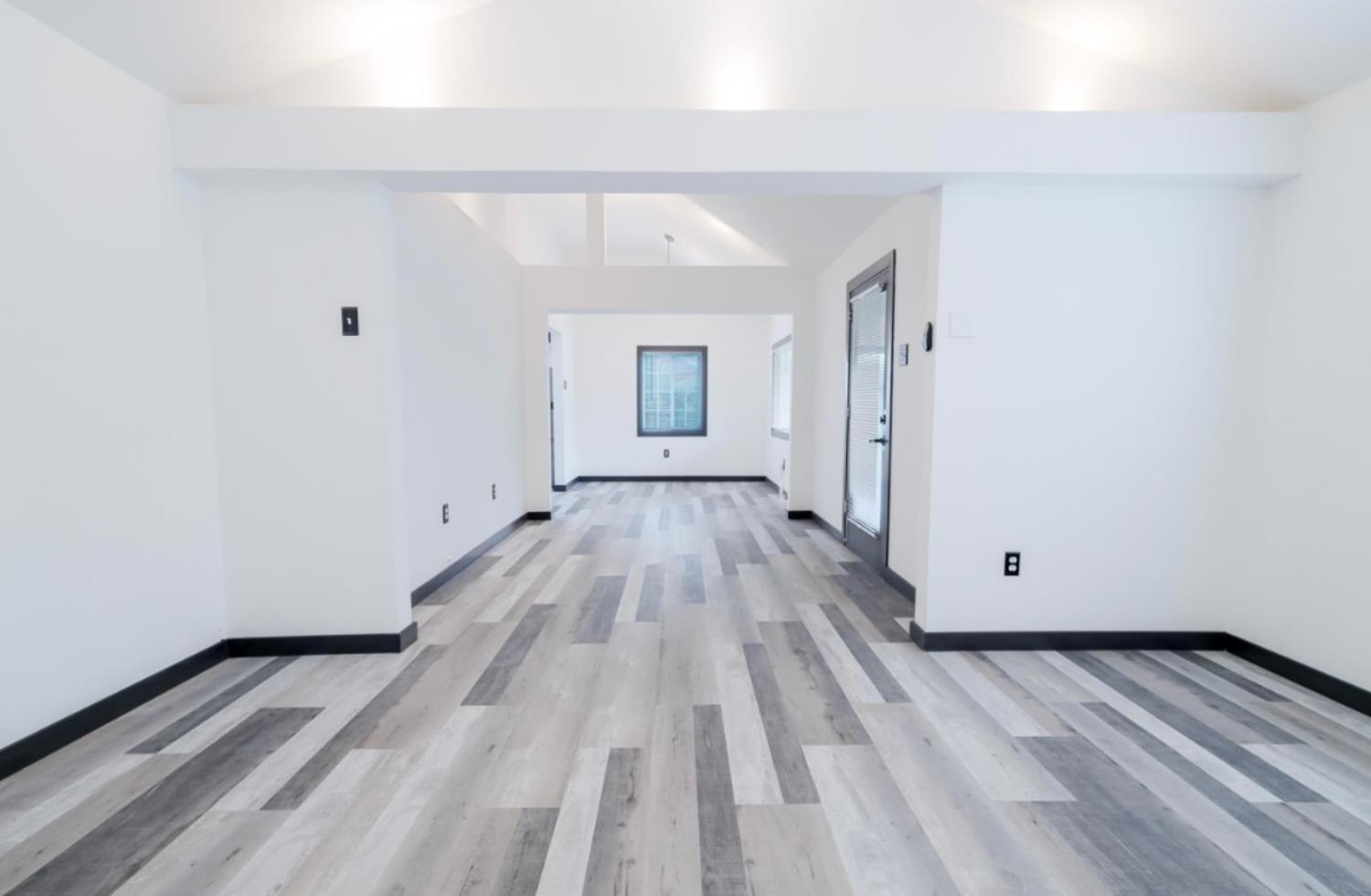 2331 Downar Way Sacramento, CA 95838 - Photo 5 of 23 a view of a room with wooden floor