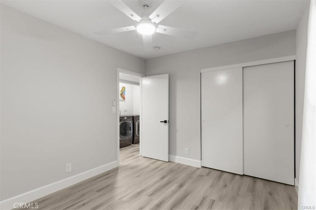 1353 Termino Avenue Long Beach, CA 90804 - Photo 14 of 30 a view of an empty room with wooden floor