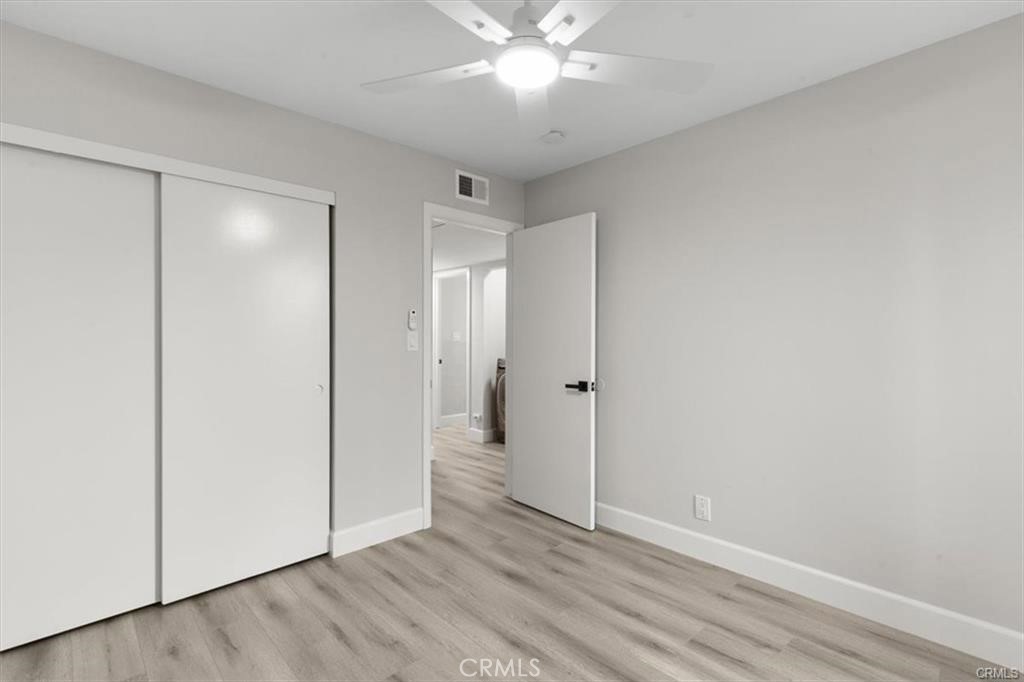 1353 Termino Avenue Long Beach, CA 90804 - Photo 16 of 30 a view of an empty room with wooden floor