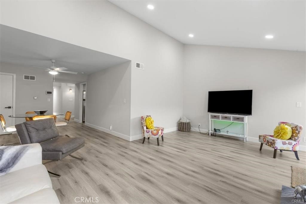 1353 Termino Avenue Long Beach, CA 90804 - Photo 7 of 30 a living room with furniture and a flat screen tv
