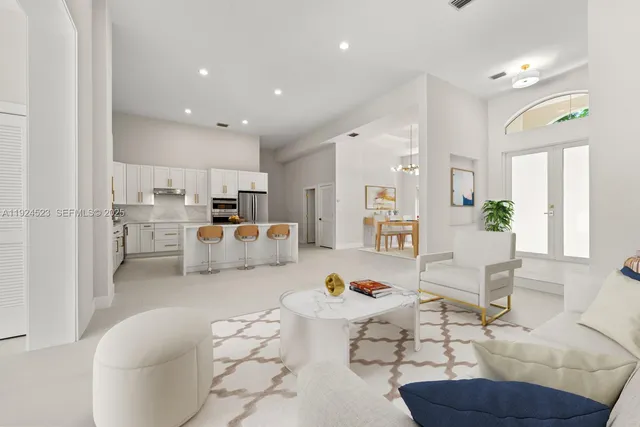 a living room with furniture and a table