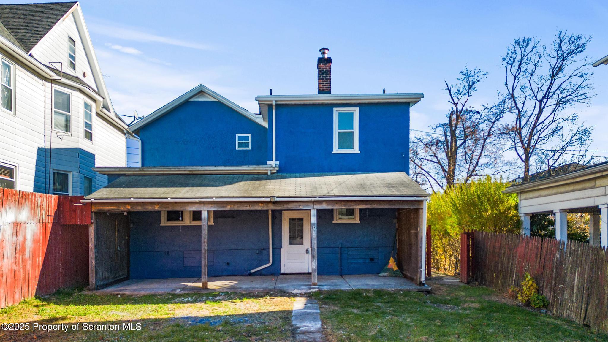 949 Taylor Avenue Scranton, PA 18510 - Photo 12 of 46 a view of a house with a yard