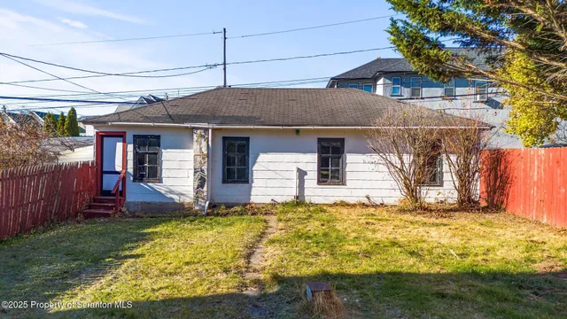a front view of house with yard