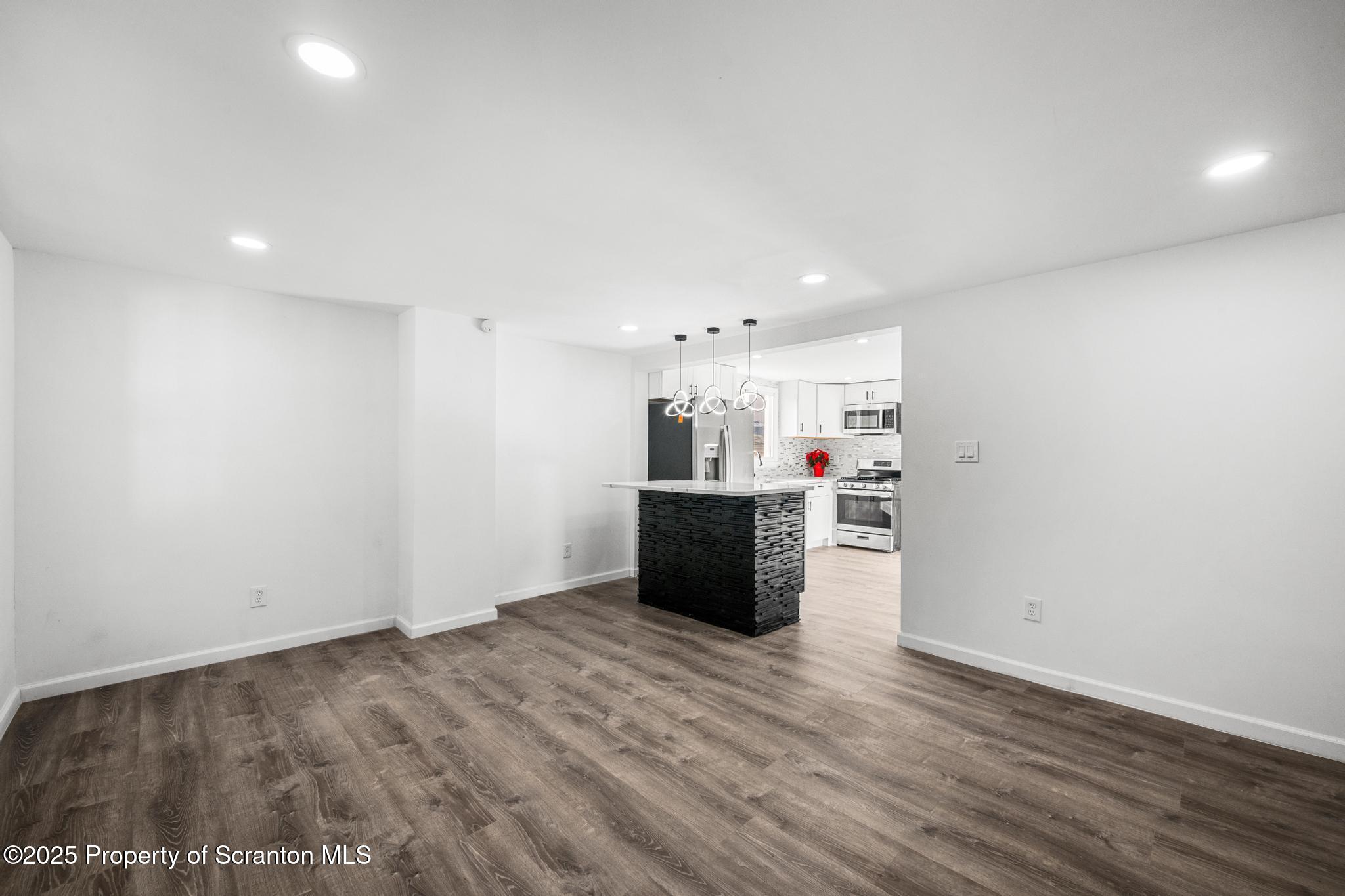 949 Taylor Avenue Scranton, PA 18510 - Photo 27 of 46 a view of a kitchen with wooden floor