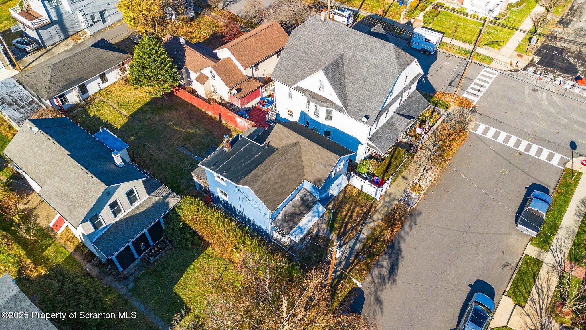 949 Taylor Avenue Scranton, PA 18510 - Photo 6 of 46 an aerial view of a house with a yard