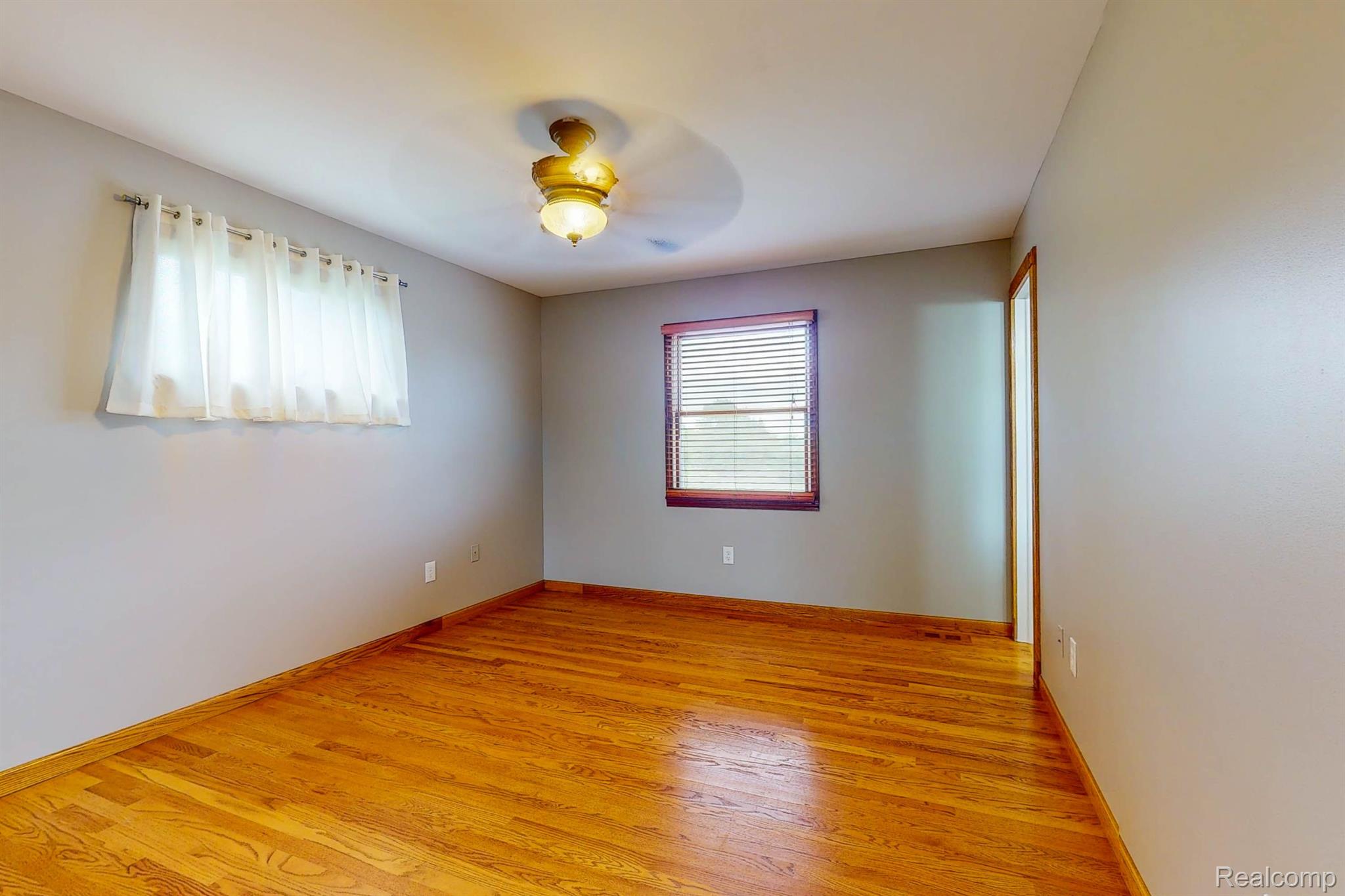 3409 Lahring Road Linden, MI 48451 - Photo 19 of 77 Primary Bedroom w/ Oak Floors