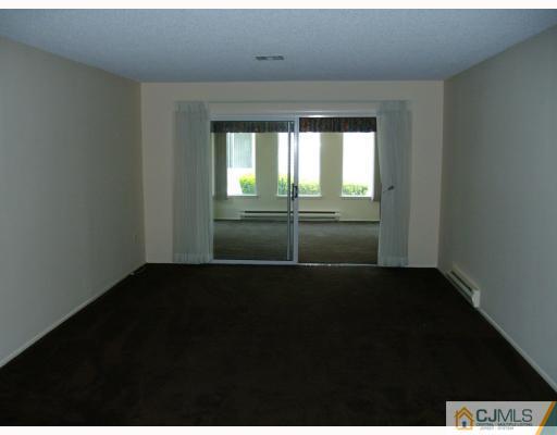 781 Risley Road Monroe Township, NJ 08831 - Photo 4 of 10 a view of an empty room and window