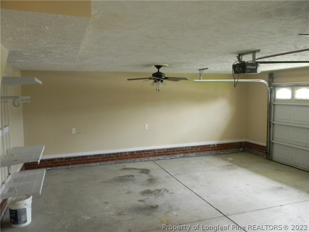 122 Middle Court Raeford, NC 28376 - Photo 20 of 23 a view of a room with racks on the wall