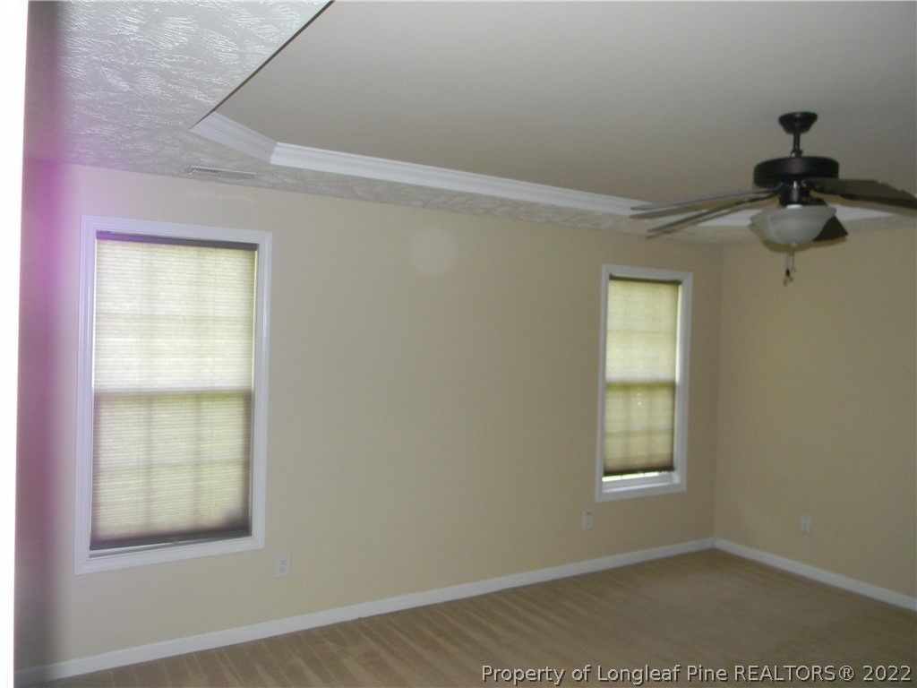122 Middle Court Raeford, NC 28376 - Photo 8 of 23 an empty room with windows