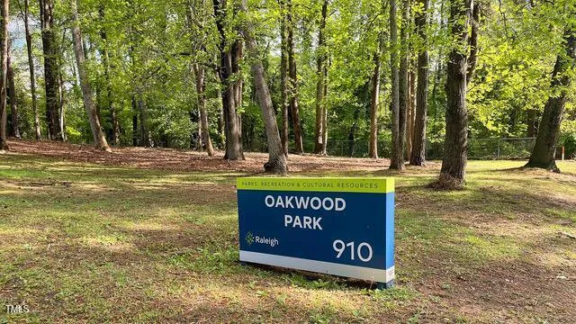 a view of outdoor space with signage and flags