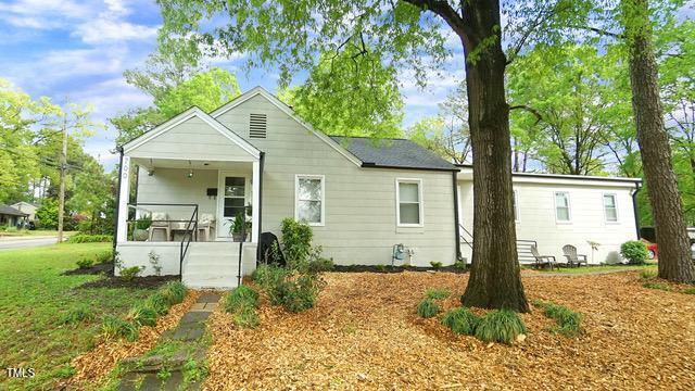 700 Glascock Street Raleigh, NC 27604 - Photo 2 of 21 a front view of a house with garden