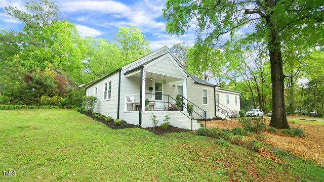 700 Glascock Street Raleigh, NC 27604 - Photo 3 of 21 a view of a house with backyard