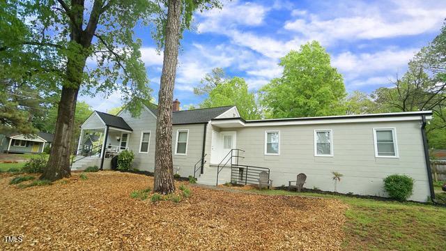 700 Glascock Street Raleigh, NC 27604 - Photo 4 of 21 a view of a house with a yard