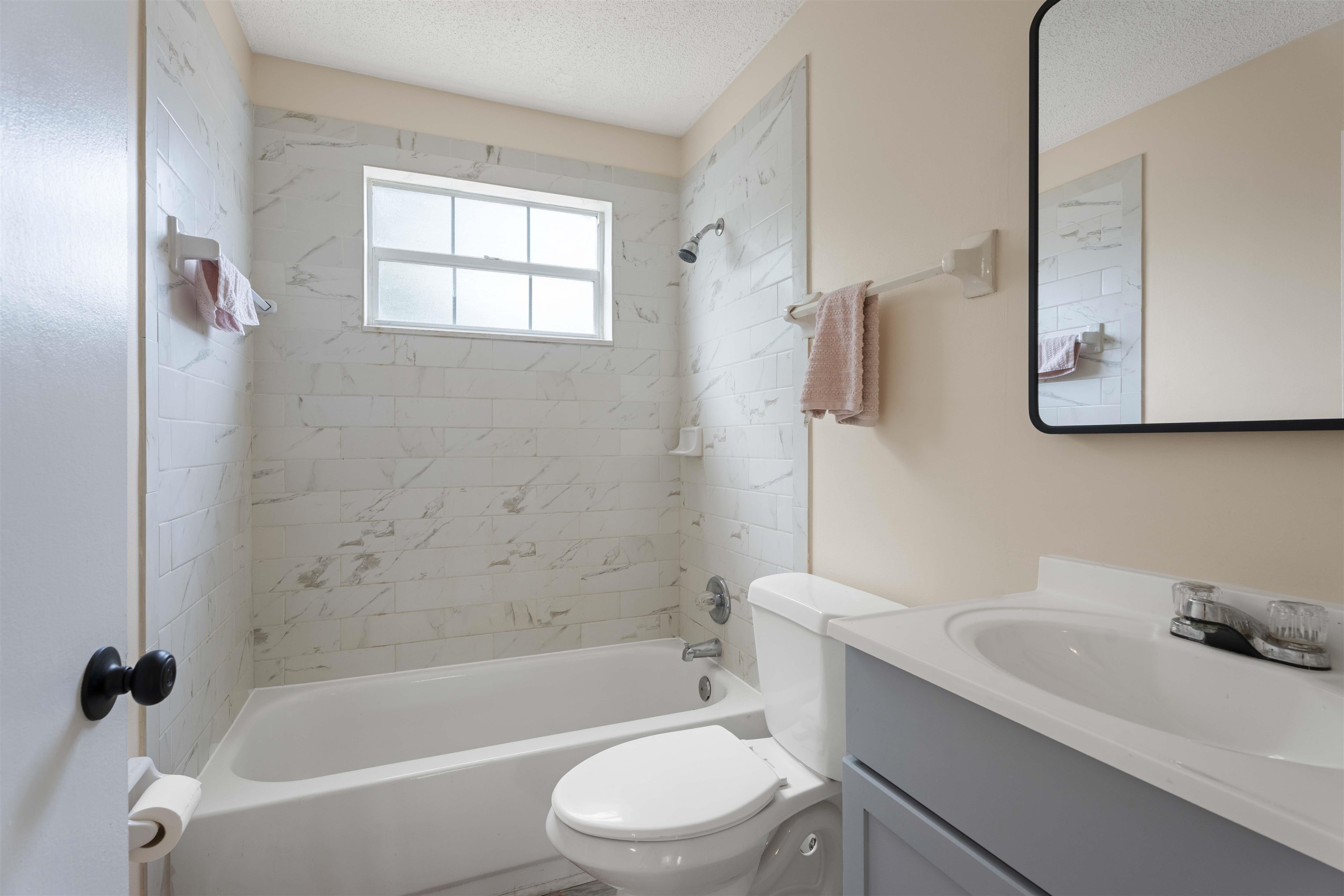 207 B Street St. Augustine Beach, FL 32080 - Photo 8 of 22 a bathroom with a sink toilet and shower